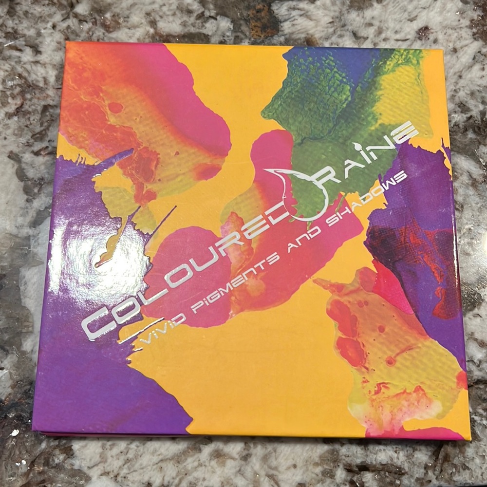 Colouredraine vivid pressed pigment and shadow palette a couple colors swatched